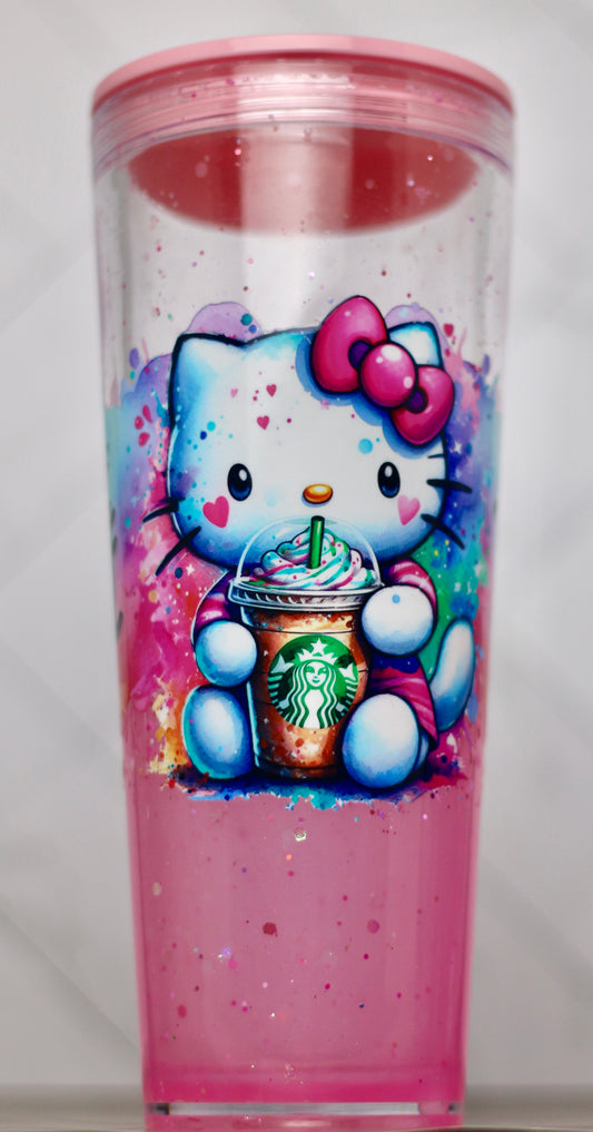Handmade Hello Kitty snow globe tumbler with pink glitter and reusable straw